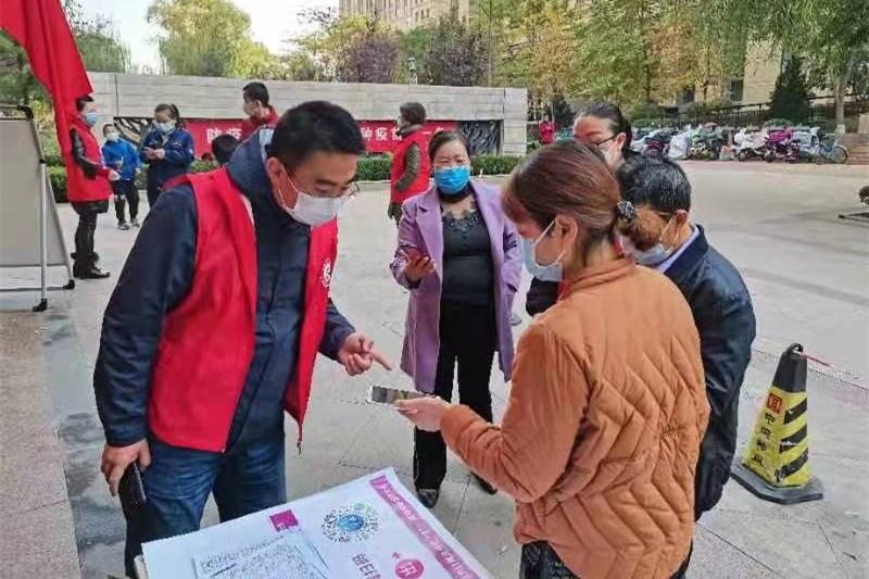 1636164772577359.jpg 志愿者 李小青_副本.jpg